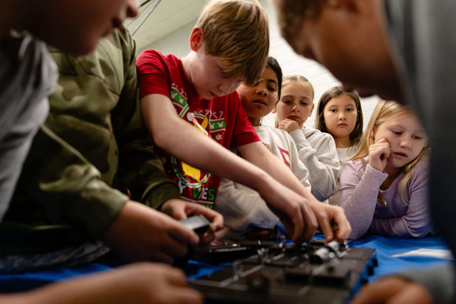 Students work together on a science, technology, engineering and mathematics challenge, facilitated...