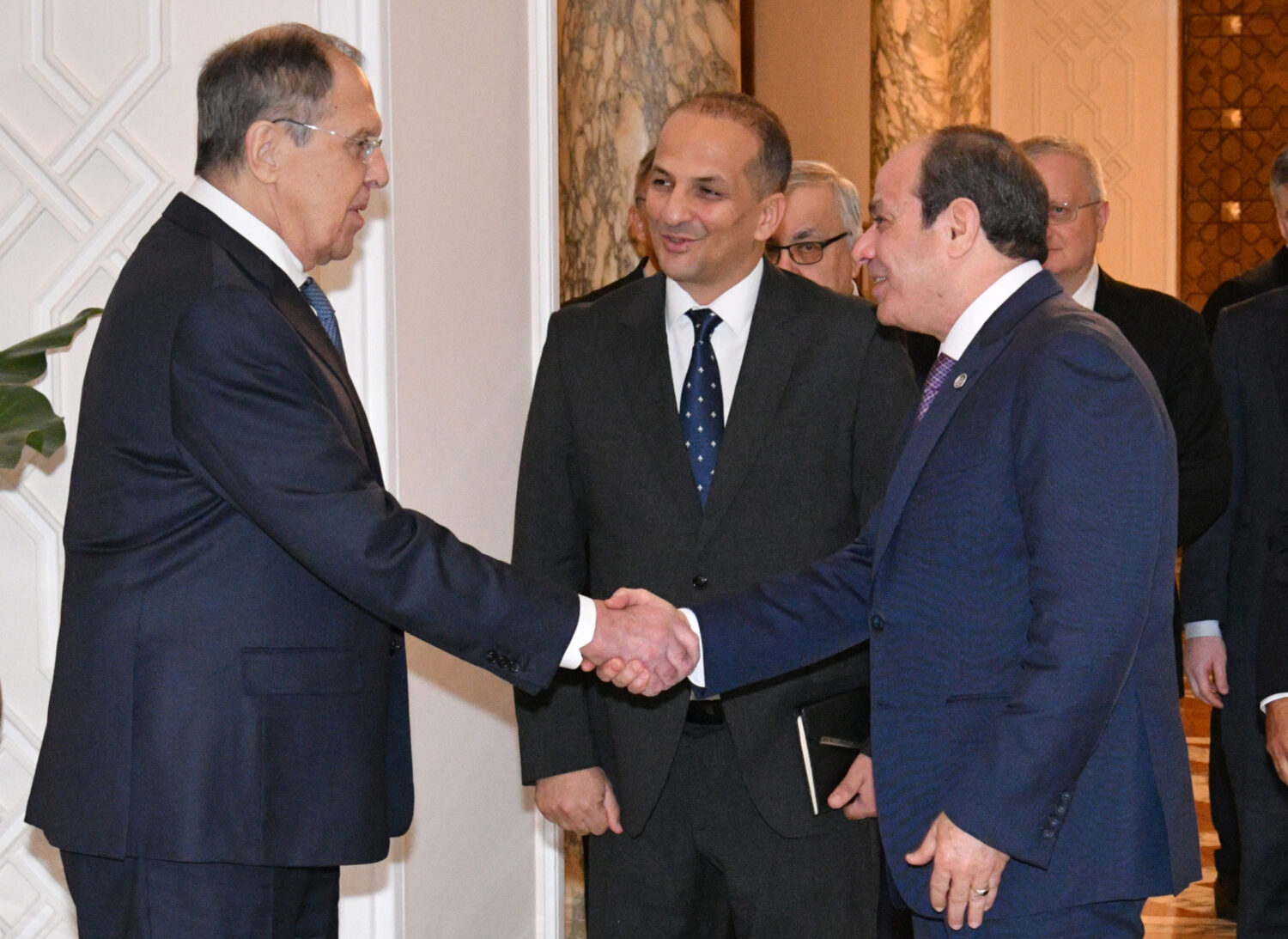 In this photo, provided by Egypt's presidency media office, Egyptian President Abdel-Fattah el-Siss...