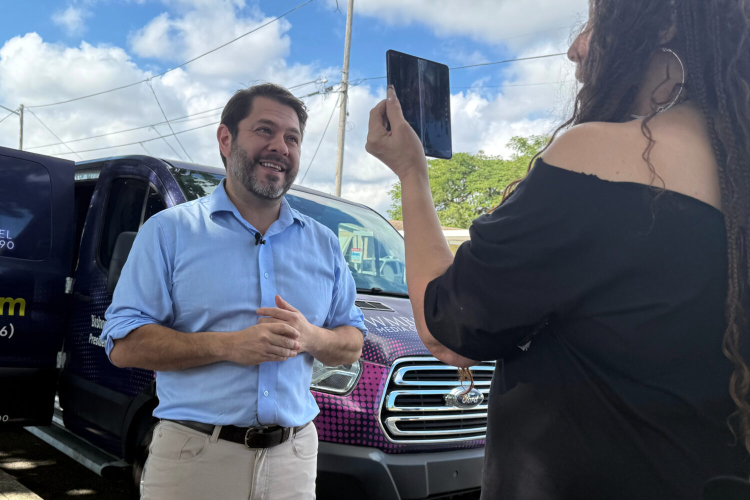Senator Ruben Gallego, has his photo taken while he campaigns with Eileen Higgins during her campai...