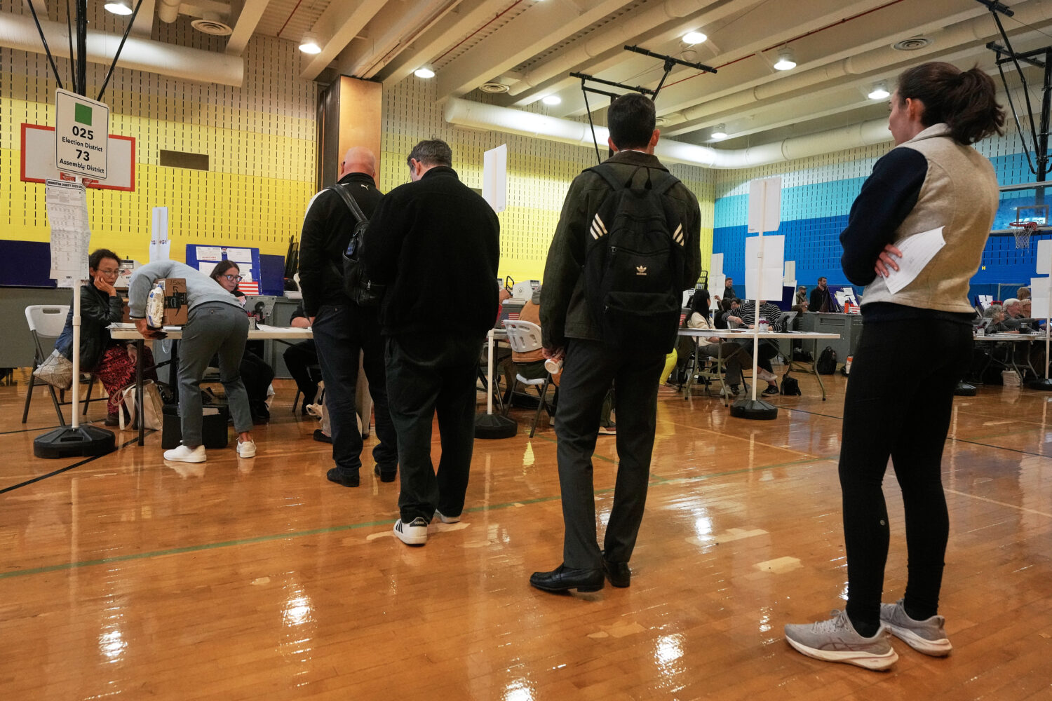 Voters sign-in at a polling site, in New York, Tuesday, Nov. 4, 2025. (AP Photo/Richard Drew)Credit...