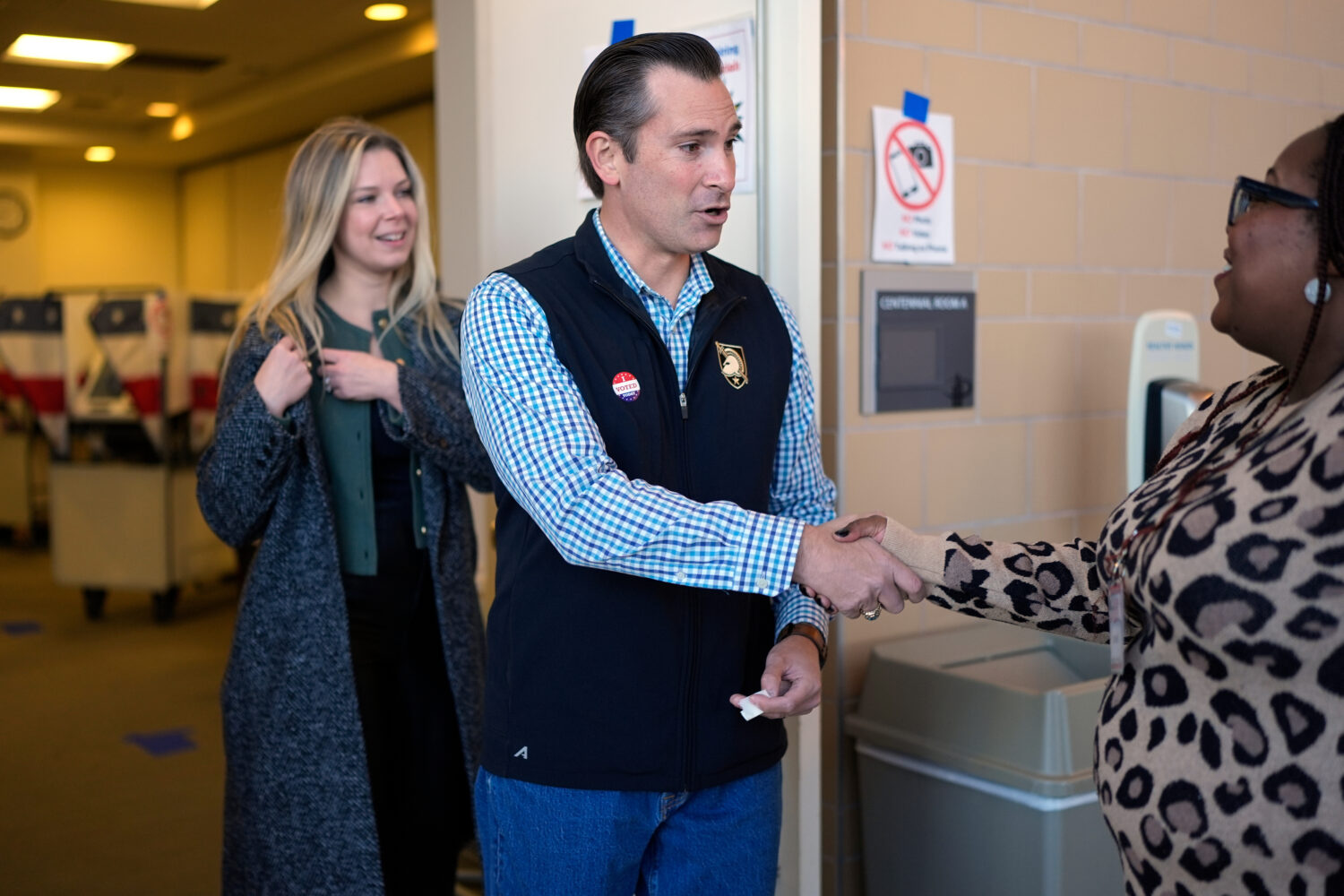 Republican congressional candidate Matt Van Epps, center, and his wife Meg Wrather, left, greet a p...