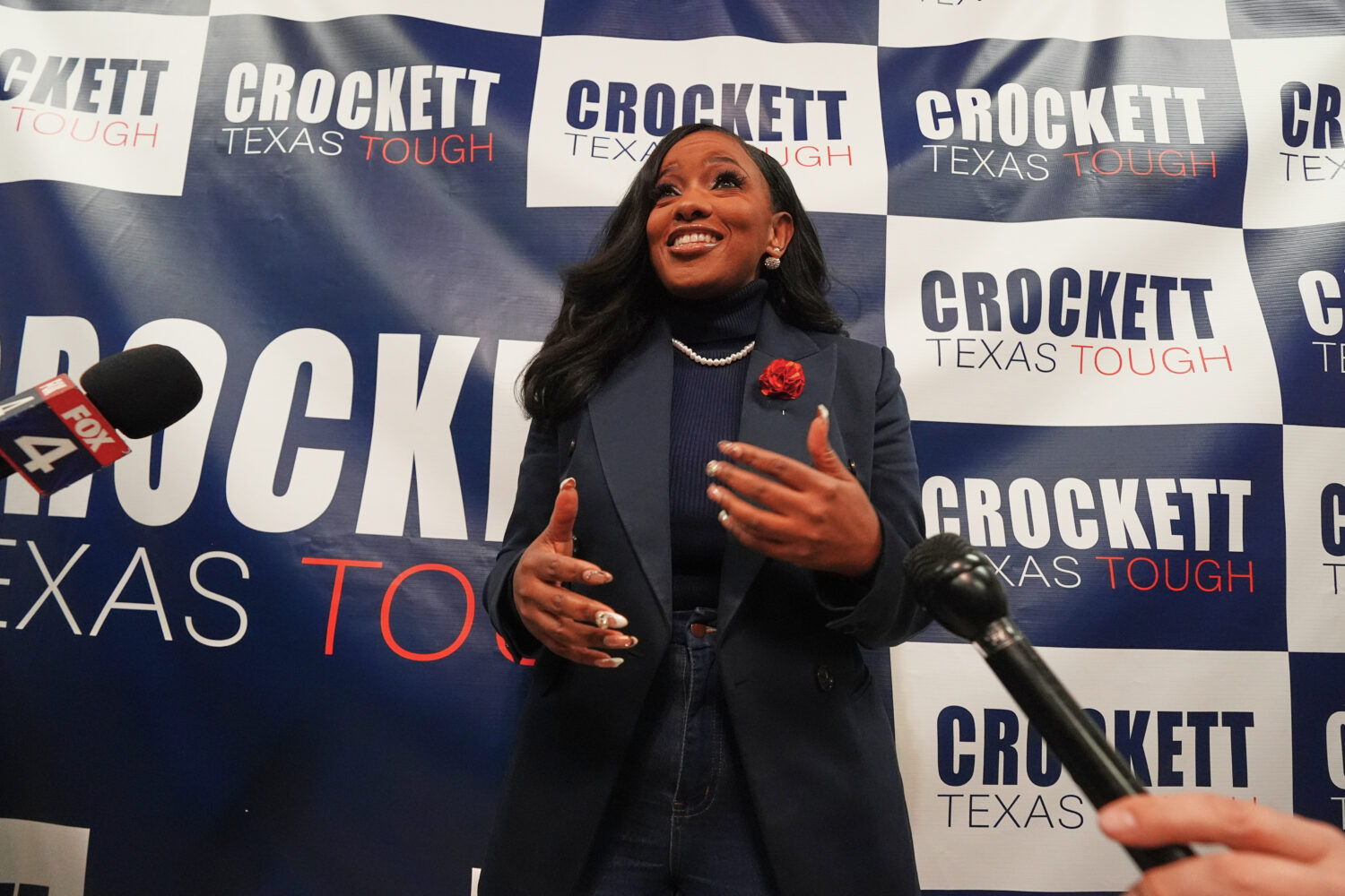 Rep. Jasmine Crockett, D-Texas, speaks to reporters after announcing her run in the Democratic prim...