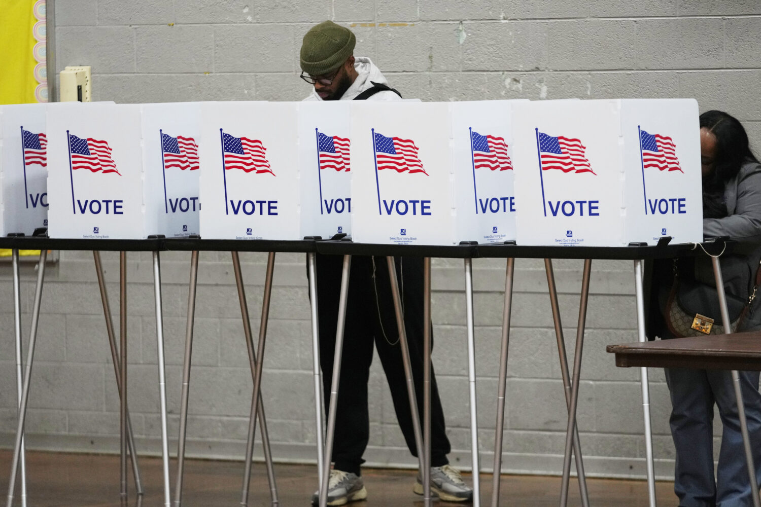FILE - Voters fill out their ballots Nov. 4, 2025, in Detroit. (AP Photo/Paul Sancya, File)Credit: ...