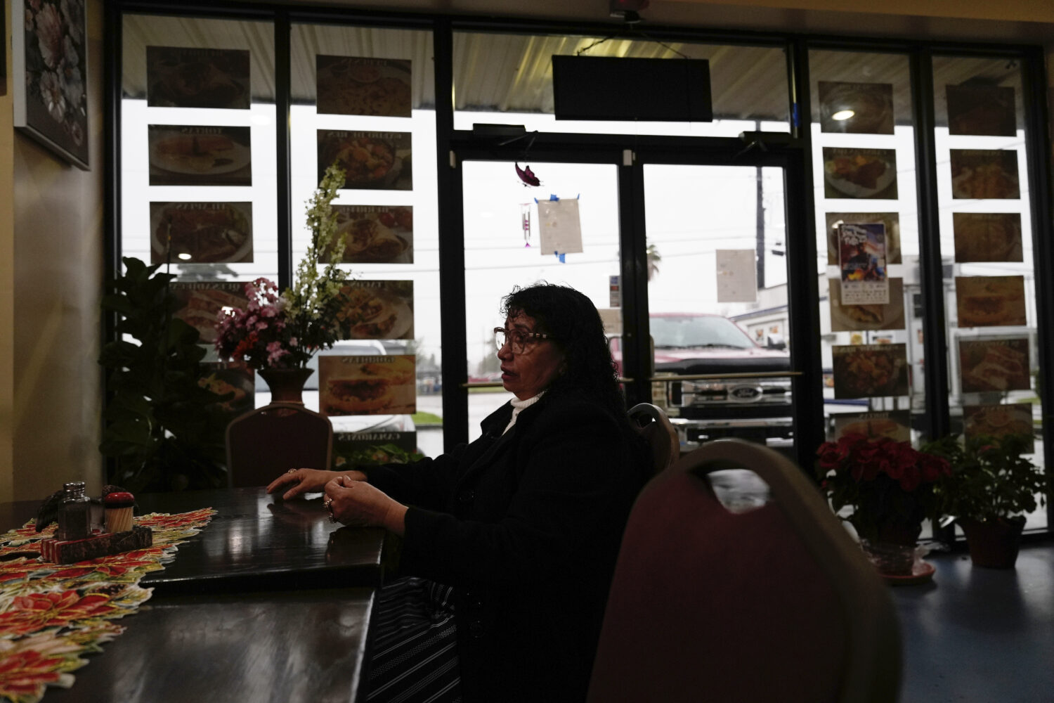 Carmela Diaz speaks inside her closed restaurant in the midst of a Customs and Border Protection im...