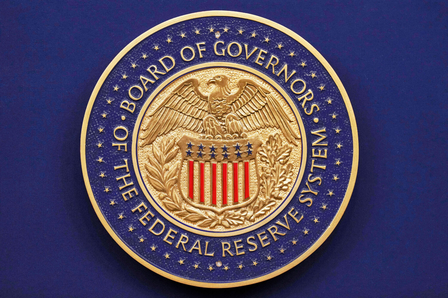 FILE - A seal is seen before Federal Reserve Chairman Jerome Powell walks out to speak during a new...