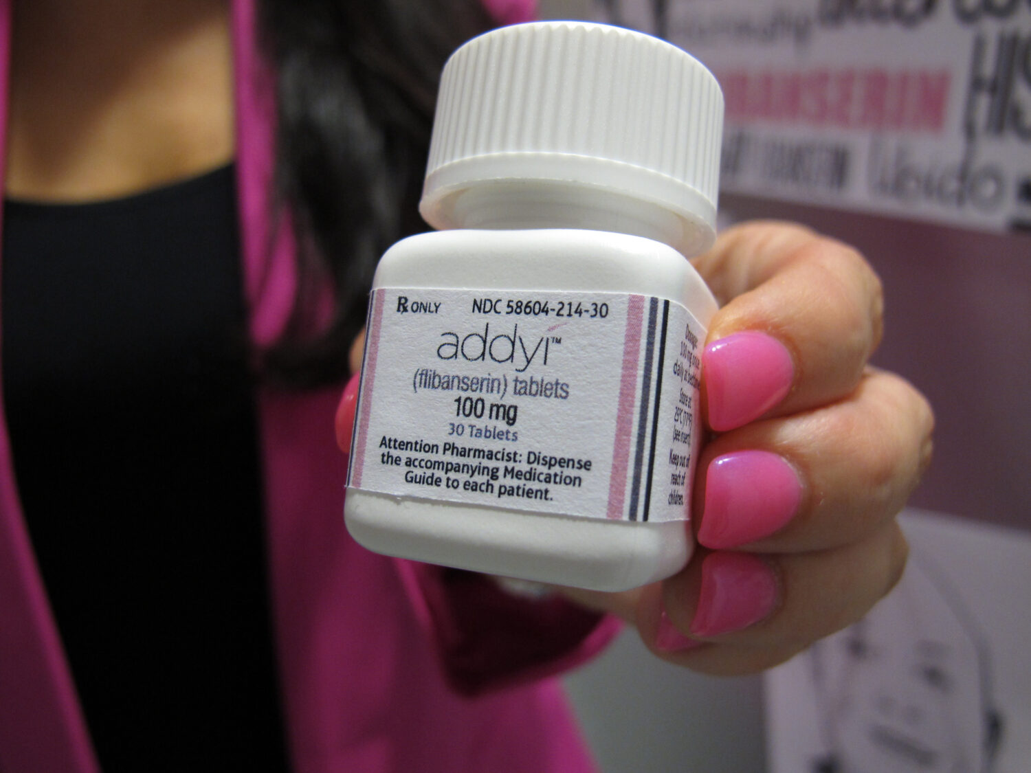 FILE - In this Aug. 18, 2015 file photo, Sprout Pharmaceuticals CEO Cindy Whitehead holds a bottle ...