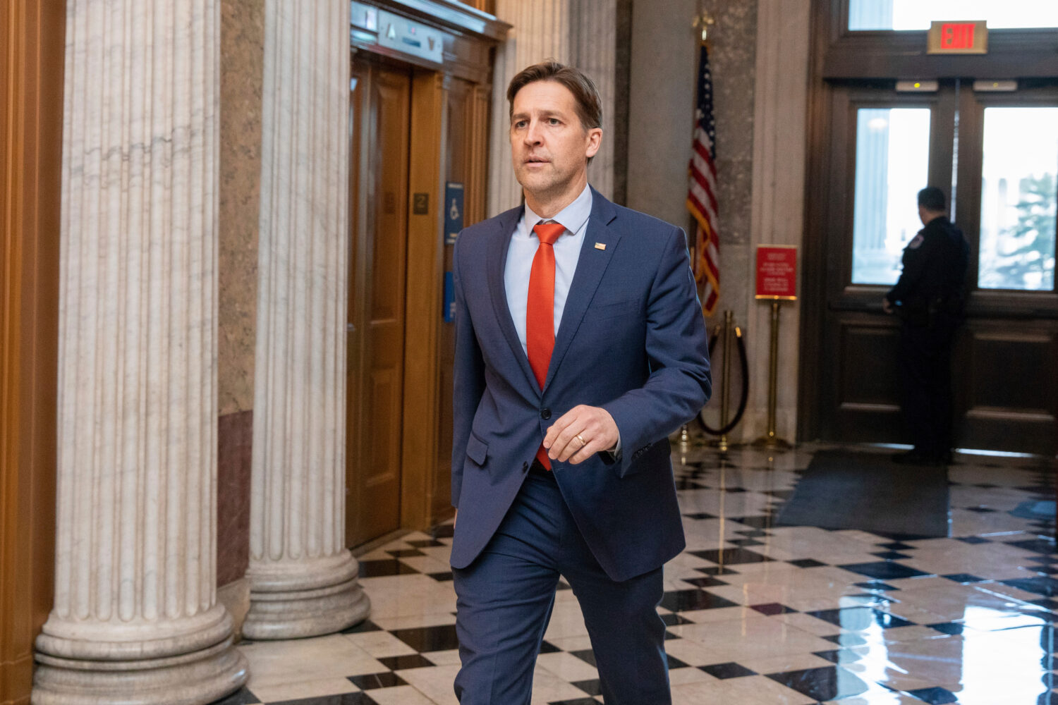 FILE - Sen. Ben Sasse, R-Neb., walks the halls of the Capitol in Washington, Wednesday, Jan. 19, 20...
