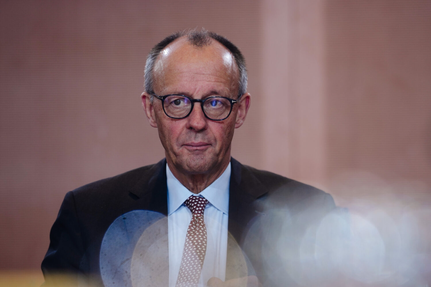 German Chancellor Friedrich Merz arrives for the cabinet meeting at the chancellery in Berlin, Germ...