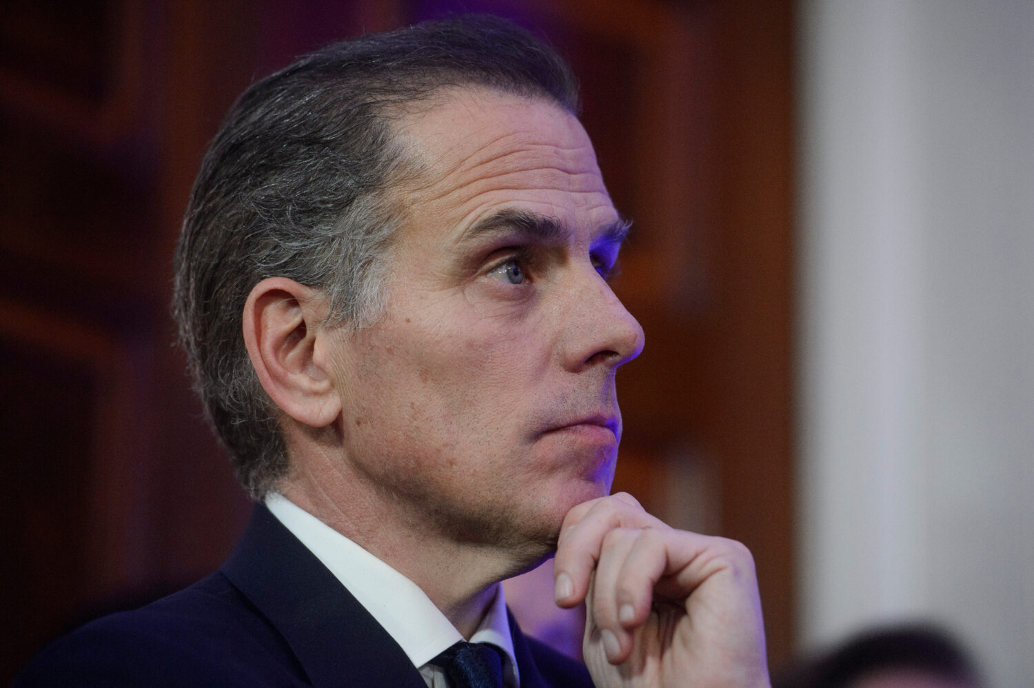 FILE - Hunter Biden listens while his father, President Joe Biden, speaks during a Hanukkah recepti...