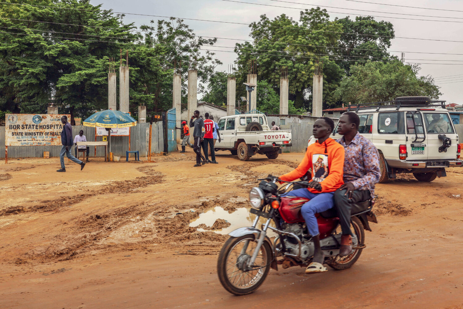 FILE - Motorists pass outside Bor State Hospital in Bor, South Sudan, Monday, Aug. 18, 2025. (AP Ph...