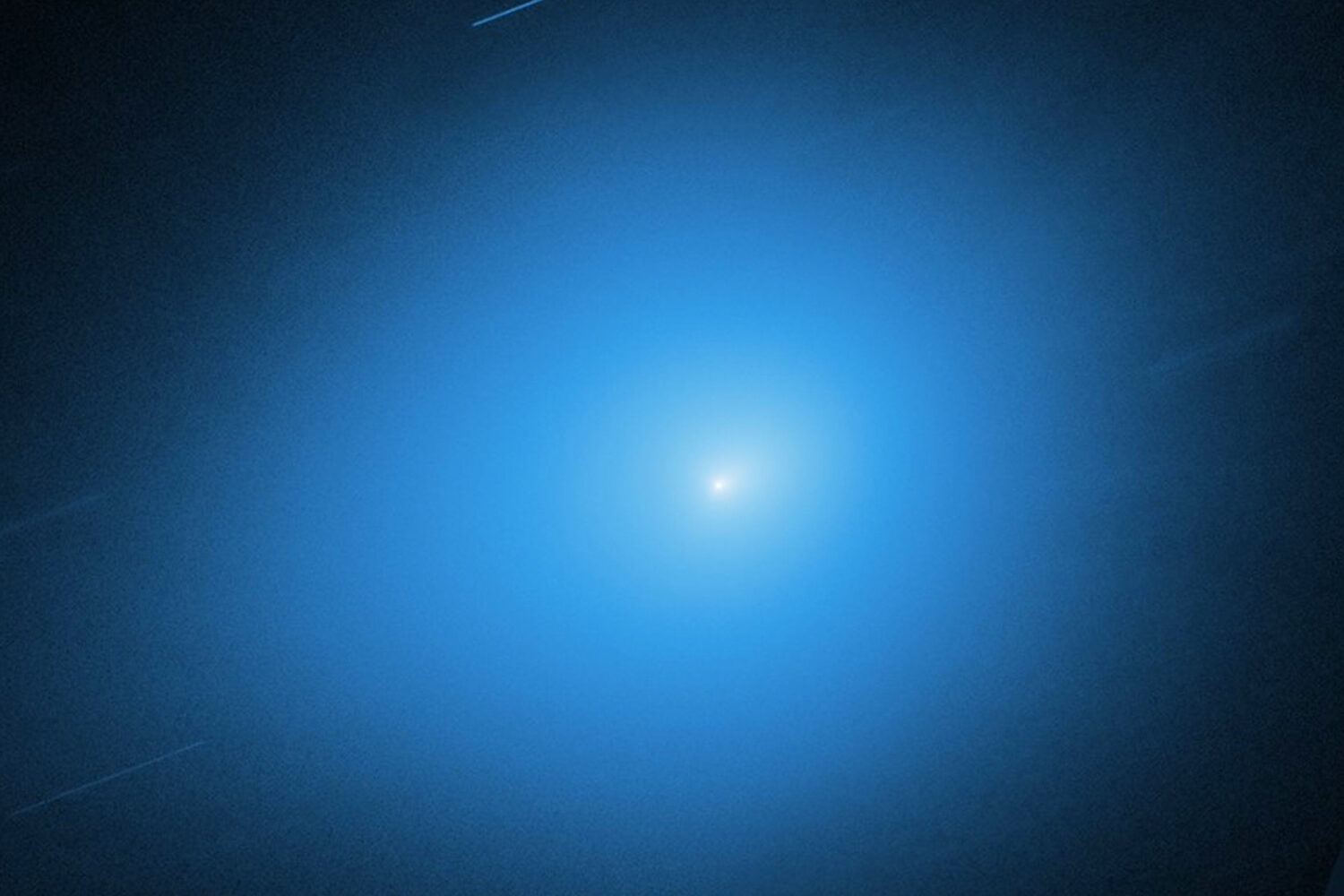 This image, provided by NASA, shows the interstellar comet 3I/Atlas captured by the Hubble Space Te...