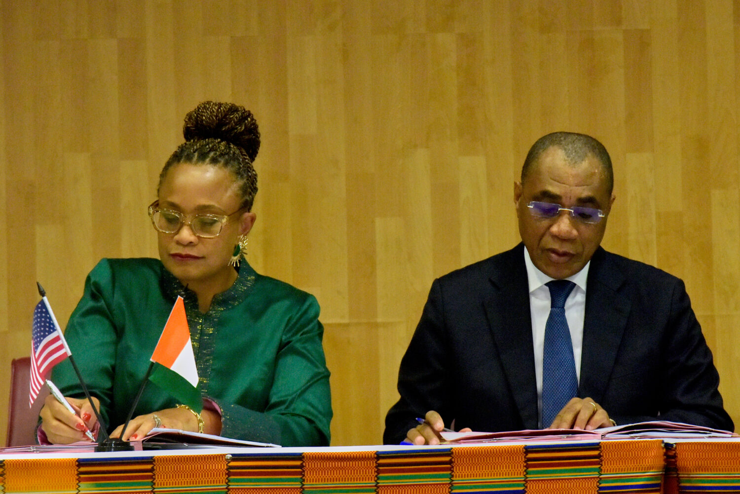 U.S. Ambassador to the Ivory Coast Jessica Davis Ba, left, and Adam Coulibaly, minister of finance ...