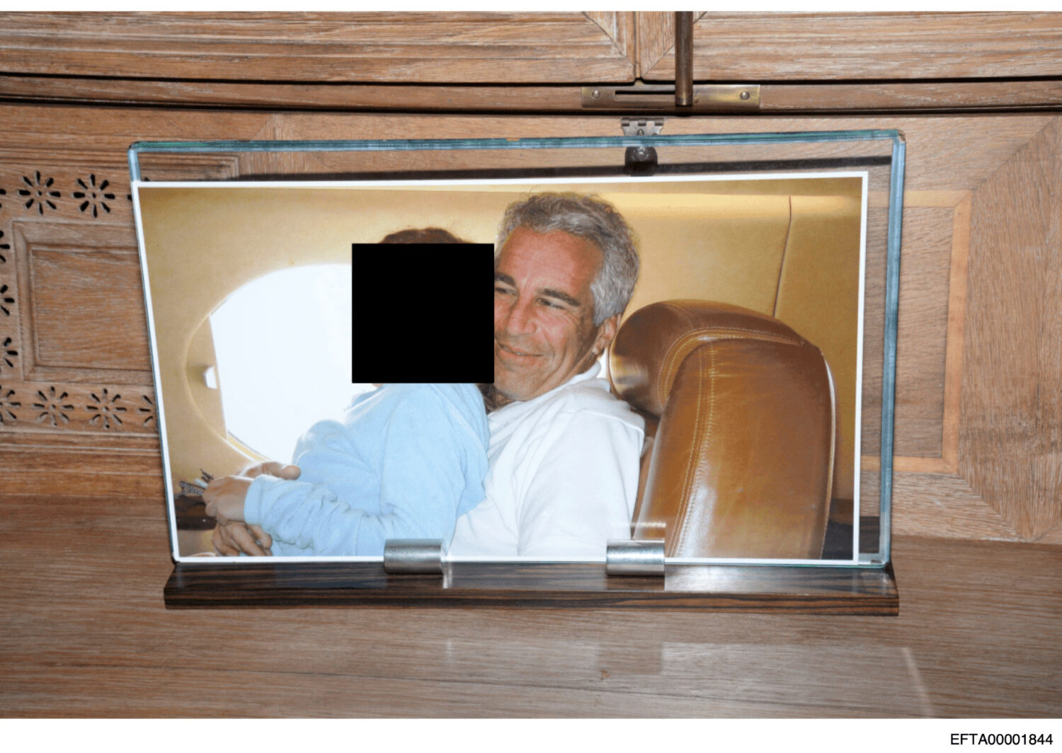 This redacted photo released by the U.S. Department of Justice shows a framed photograph of Jeffrey...