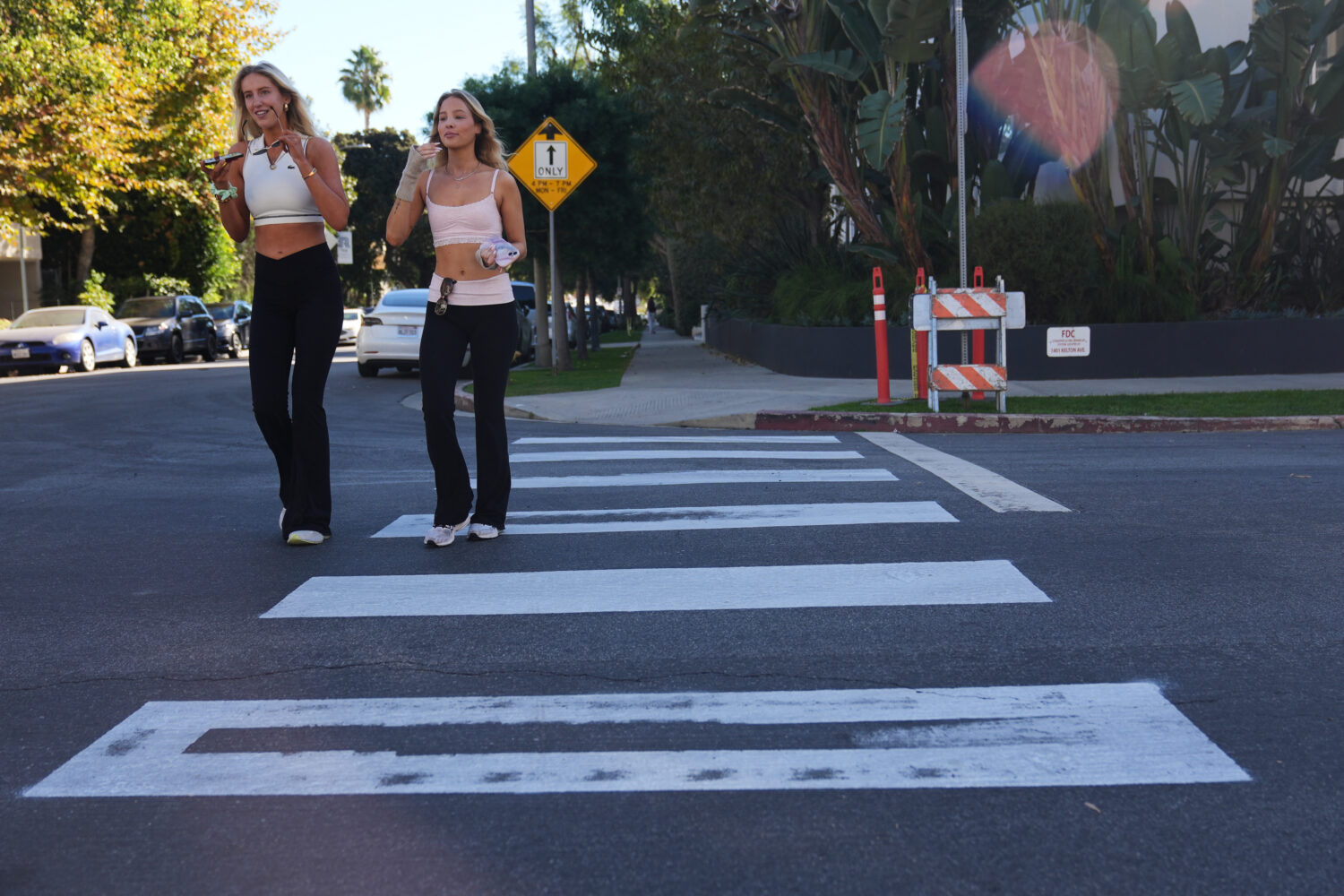 Crosswalks painted by activists are shown at the intersection of Wilkins Ave. and Kelton Ave. in th...