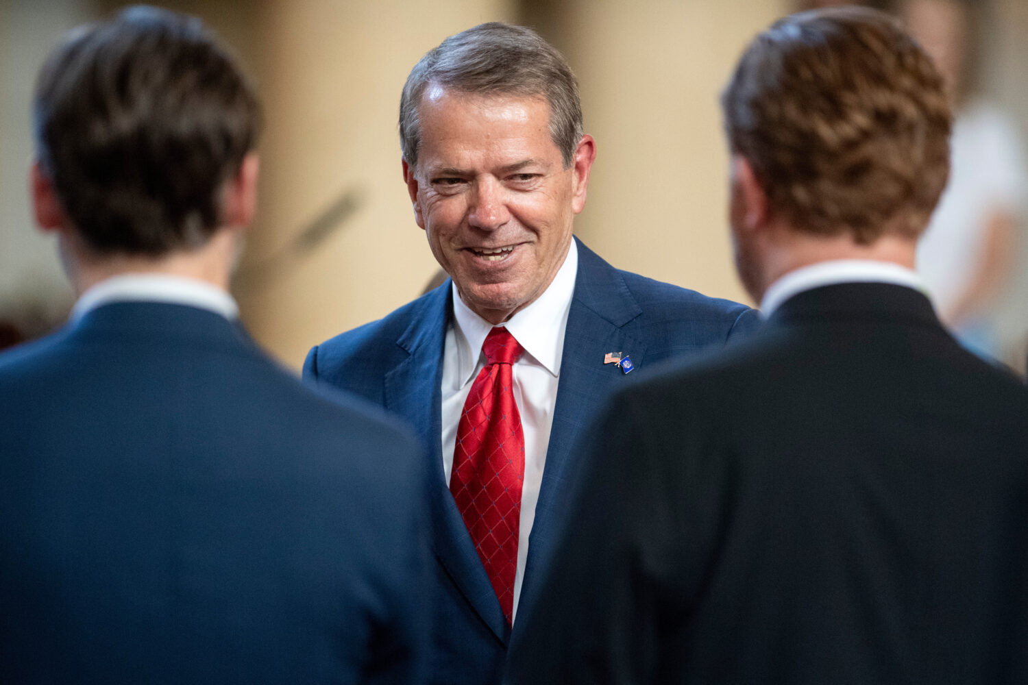 FILE - Nebraska Gov. Jim Pillen greets state senators before giving a speech on June 2, 2025, in Li...