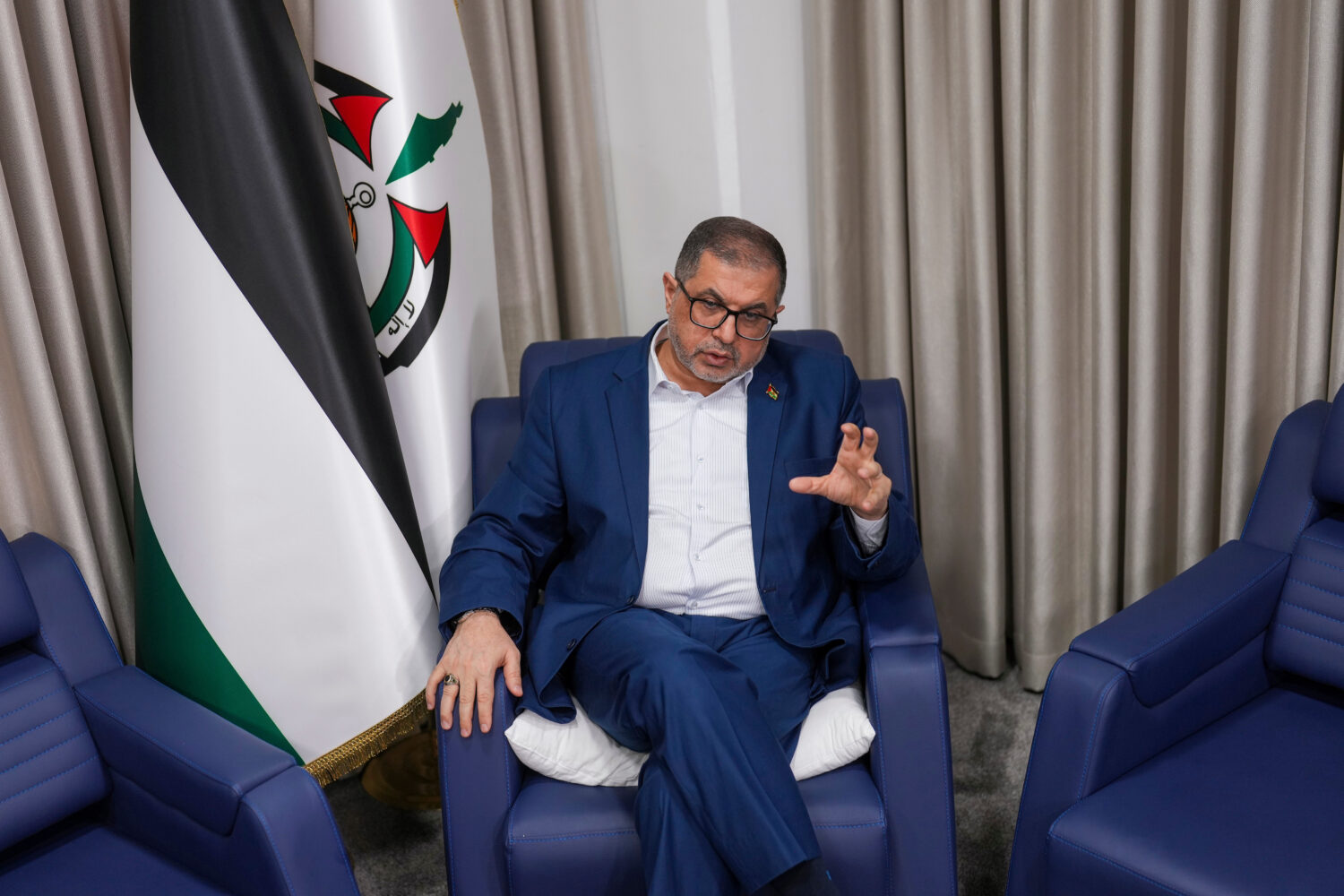 FILE - Bassem Naim, an official in Hamas' political wing, speaks in Istanbul, Turkey, Thursday, Dec...