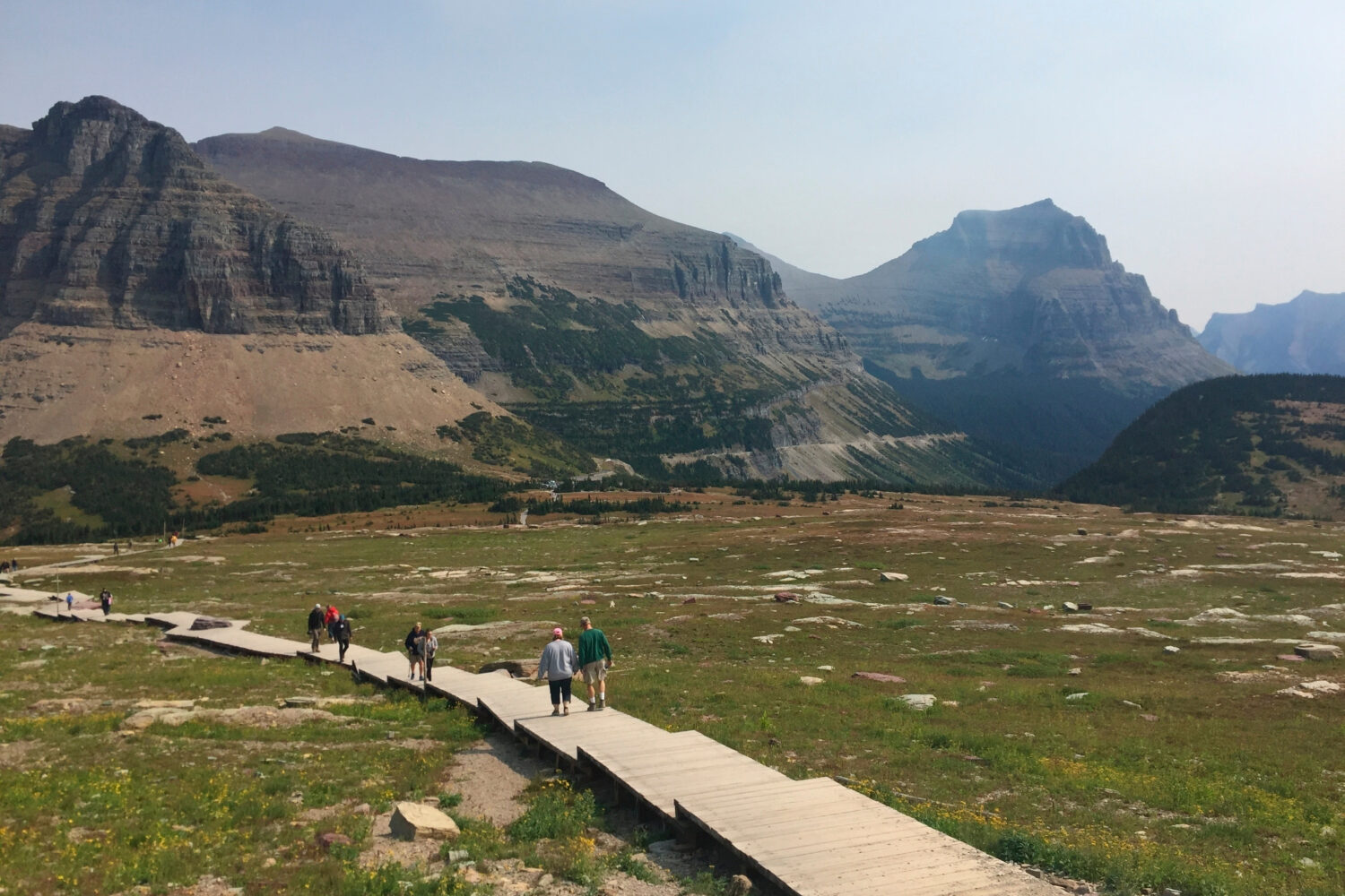 File - People hike at Glacier National Park in Montana. (AP Photo/Beth J. Harpaz, File)Credit: ASSO...