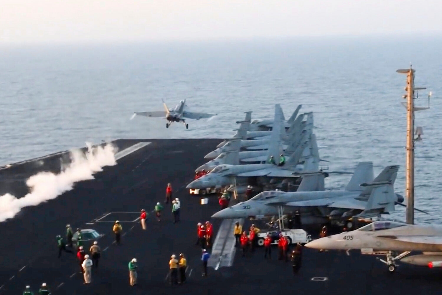 FILE - This image taken from video provided by the U.S. Navy shows an aircraft launching from the U...