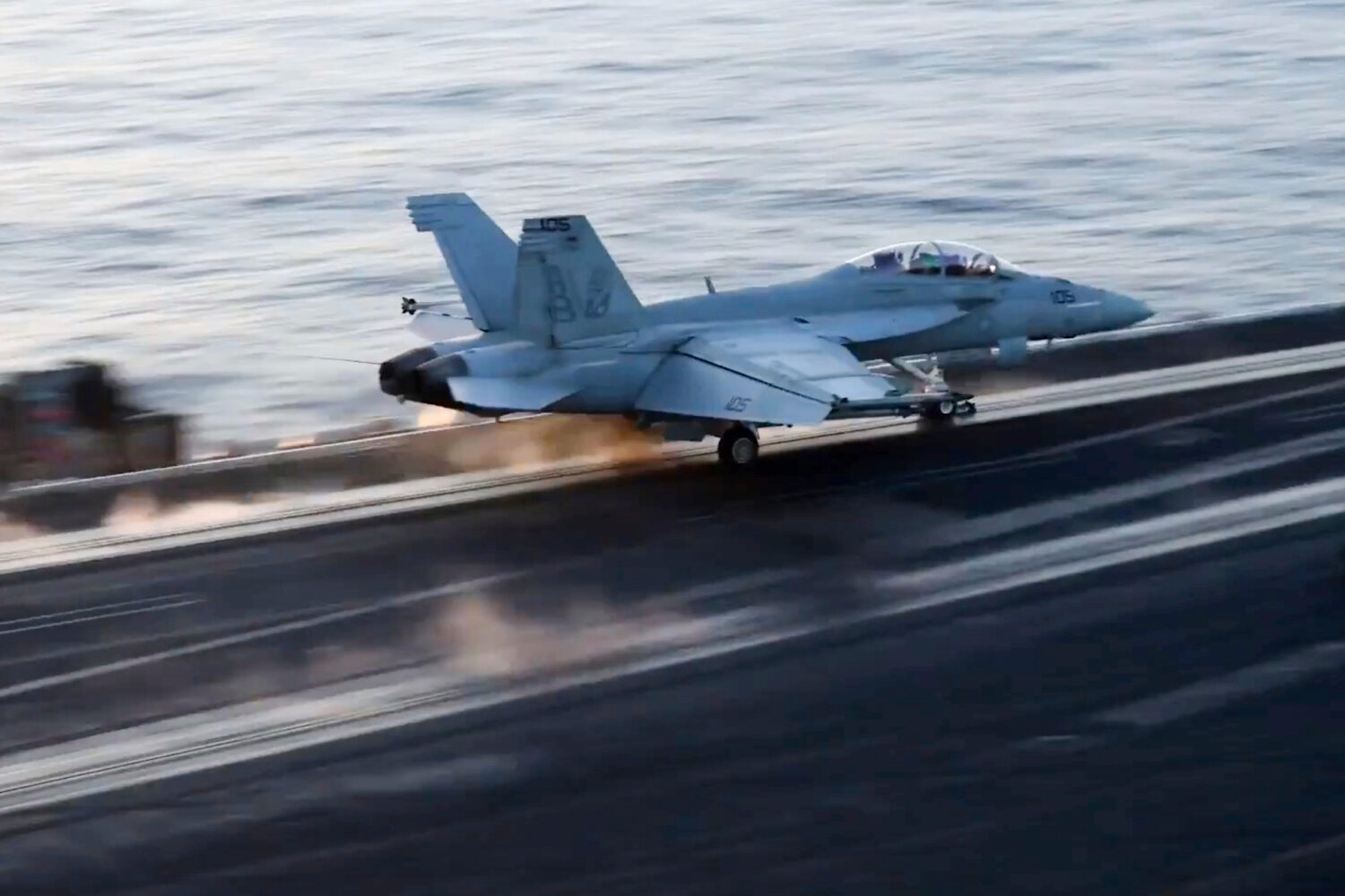 FILE - This image taken from video provided by the U.S. Navy shows an aircraft launching from the U...