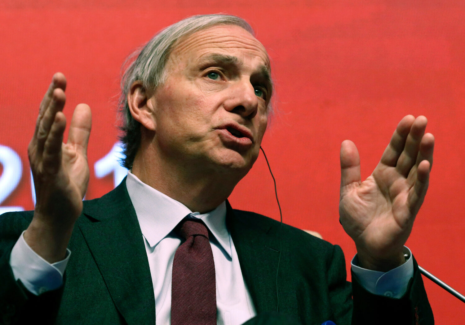 FILE - Bridgewater Associates Chairman Ray Dalio speaks during the Economic Summit held for the Chi...