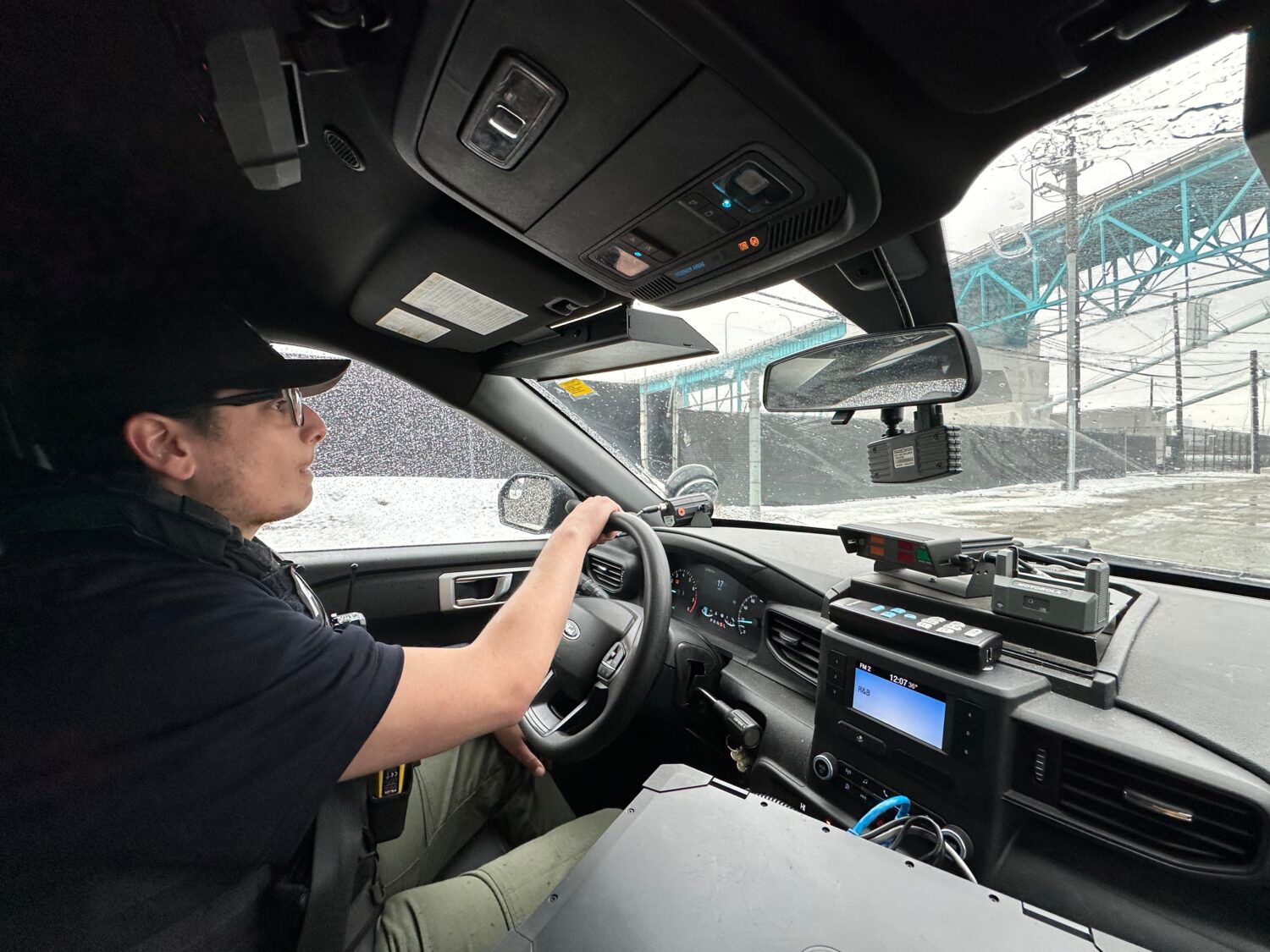 Detroit Police Commercial Theft Section Officer Ibrahim Kakish participates in a demonstration of h...