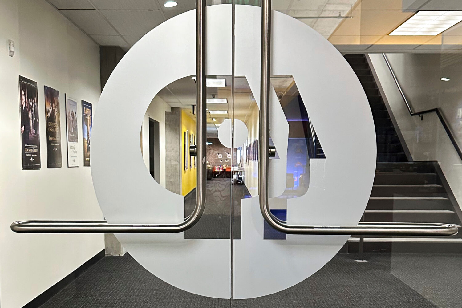 FILE - An entrance to the Arizona PBS offices in the Walter Cronkite School of Journalism and Mass ...