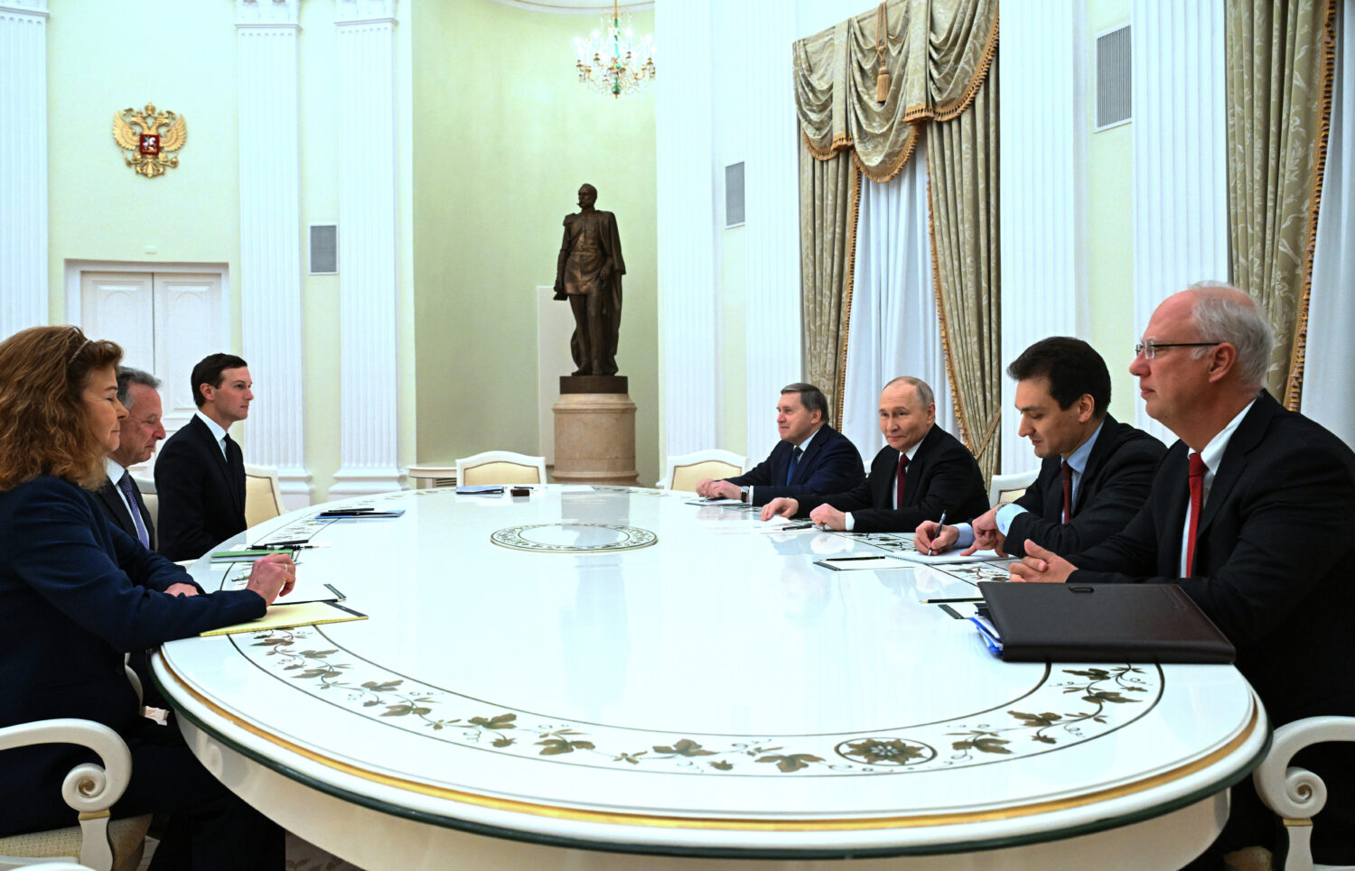 FILE - Russian President Vladimir Putin, third from right, Russian Presidential Foreign Policy Advi...