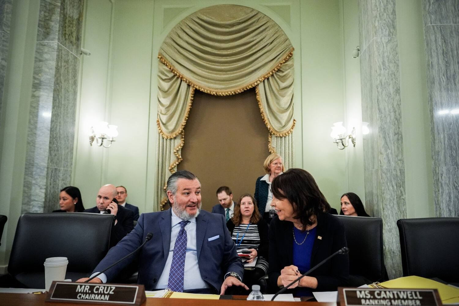 Sen. Ted Cruz, R-Texas, left, chairman of the Senate Commerce, Science and Transportation Committee...