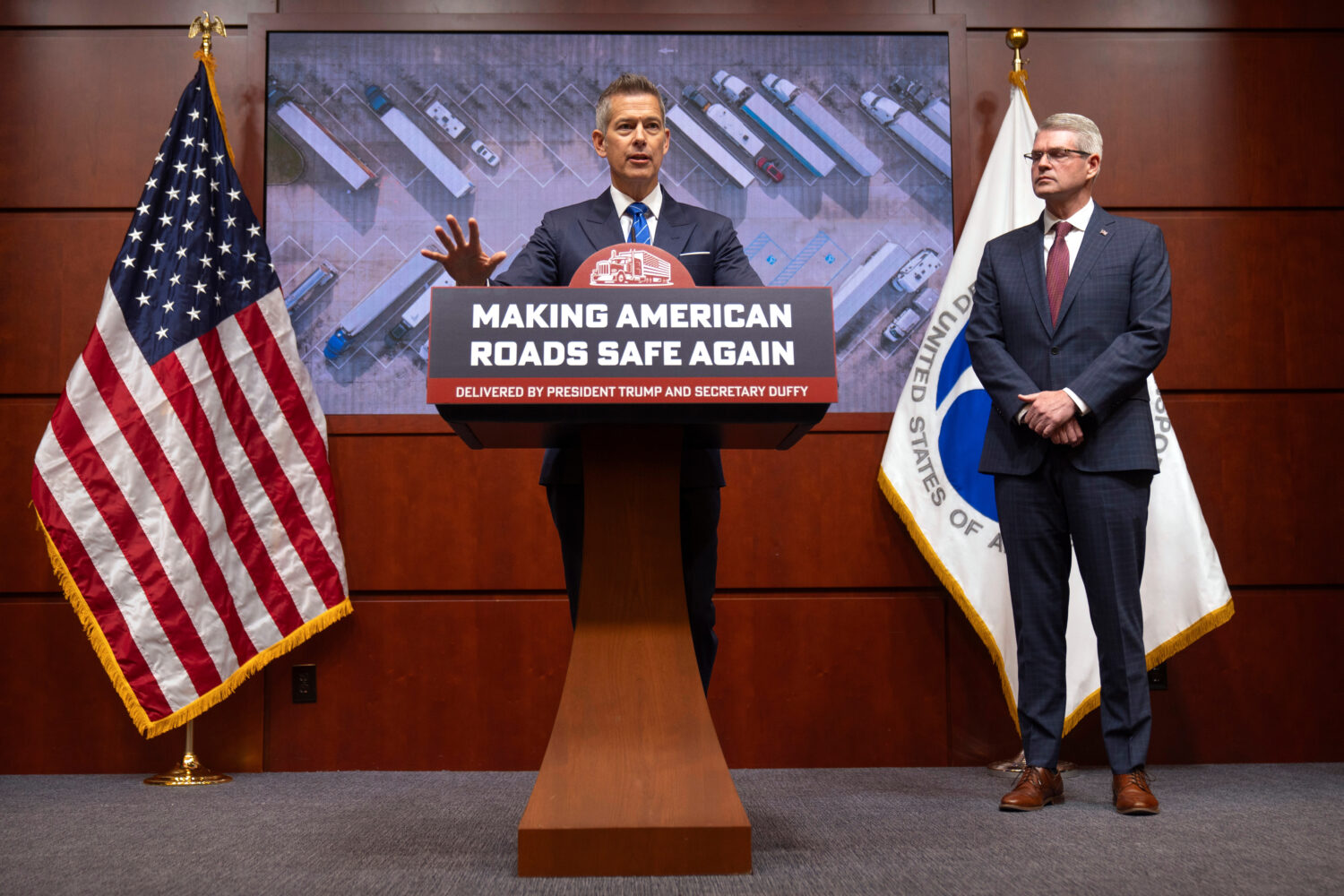 Transportation Secretary Sean Duffy speaks as Derek Barrs, Administrator of the Federal Motor Carri...