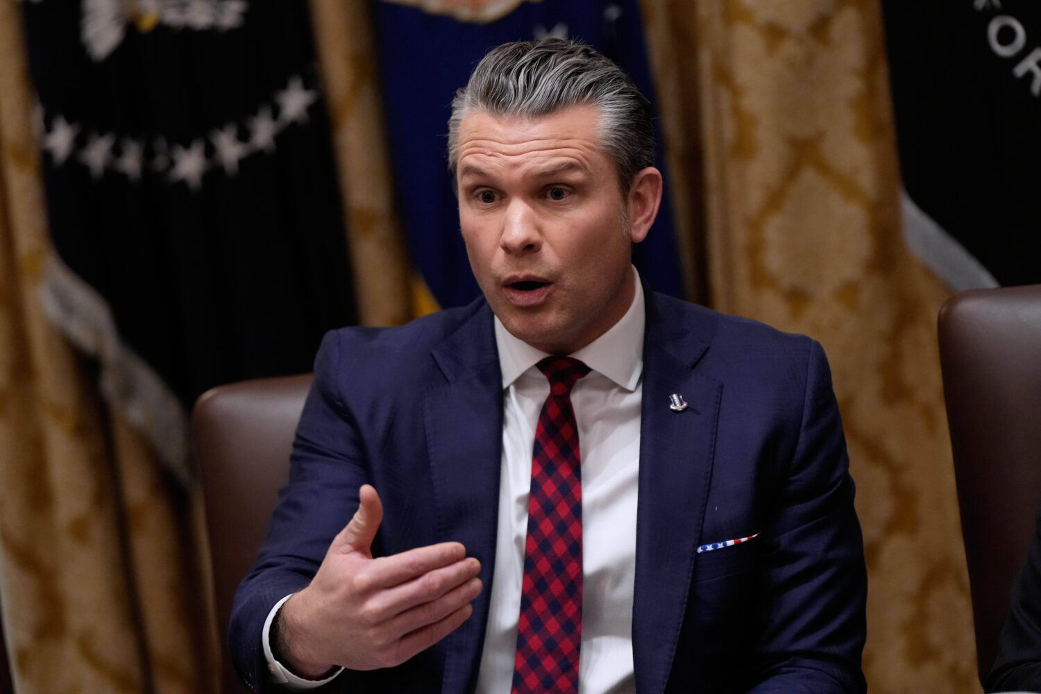 Defense Secretary Pete Hegseth speaks during a Cabinet meeting at the White House, Tuesday, Dec. 2,...