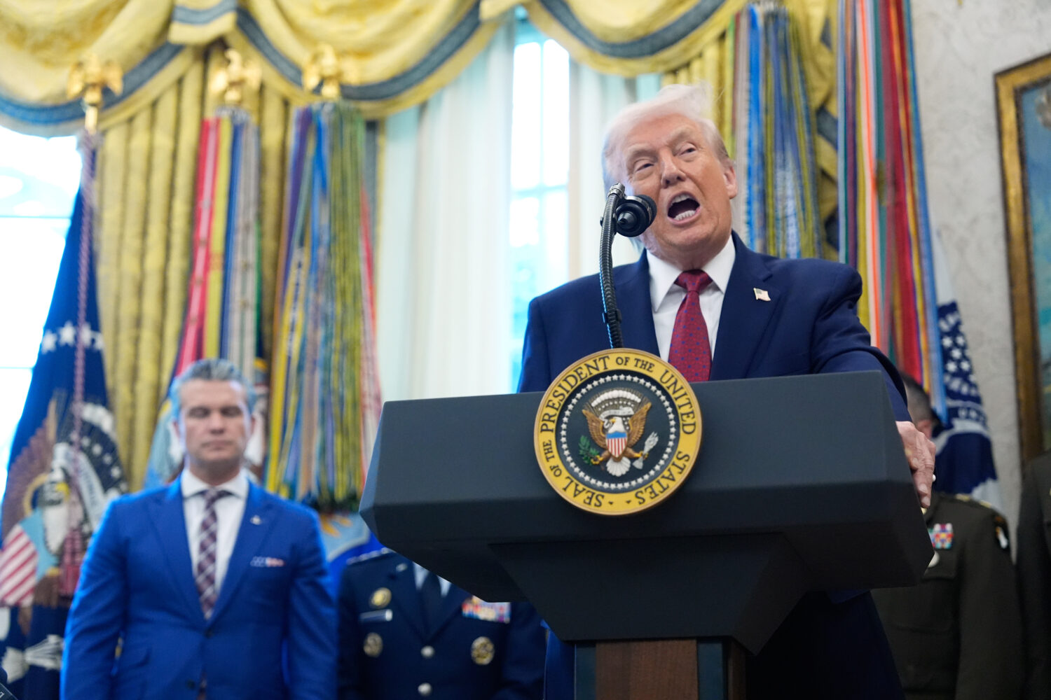 President Donald Trump speaks during a Mexican Border Defense Medal presentation in the Oval Office...