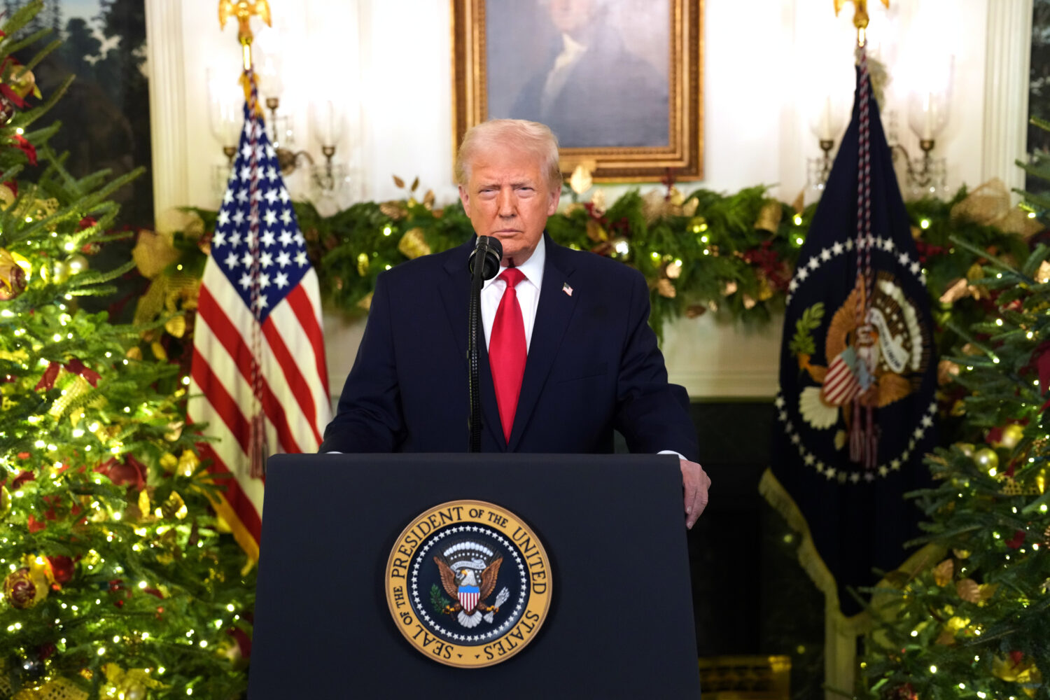 President Donald Trump speaks during an address to the nation from the Diplomatic Reception Room at...