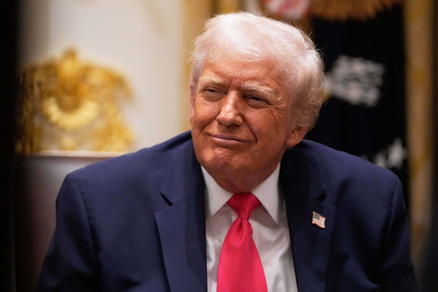 President Donald Trump listens during a Cabinet meeting at the White House, Tuesday, Dec. 2, 2025, ...