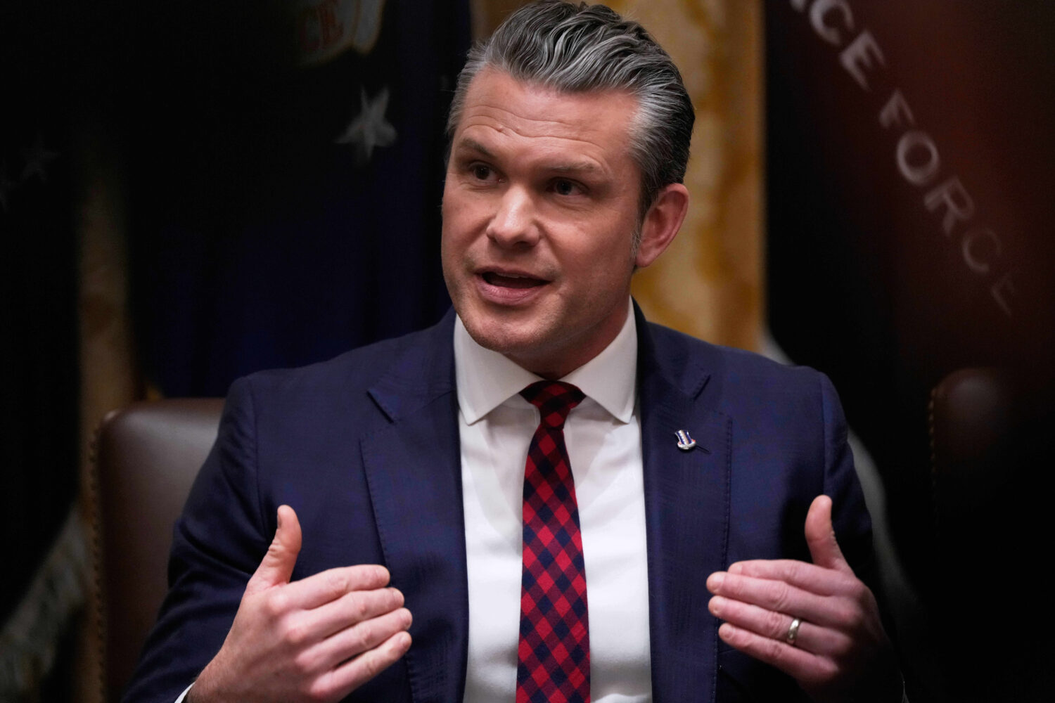 Defense Secretary Pete Hegseth speaks during a cabinet meeting at the White House, Tuesday, Dec. 2,...