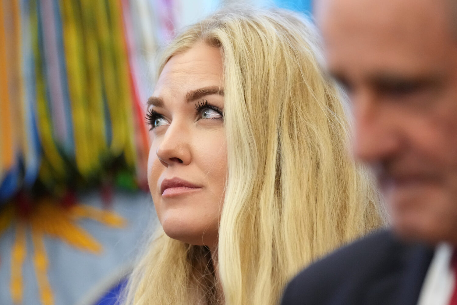 Erika Kirk listens as President Donald Trump speaks before Sergio Gor was sworn-in as U.S. Ambassad...