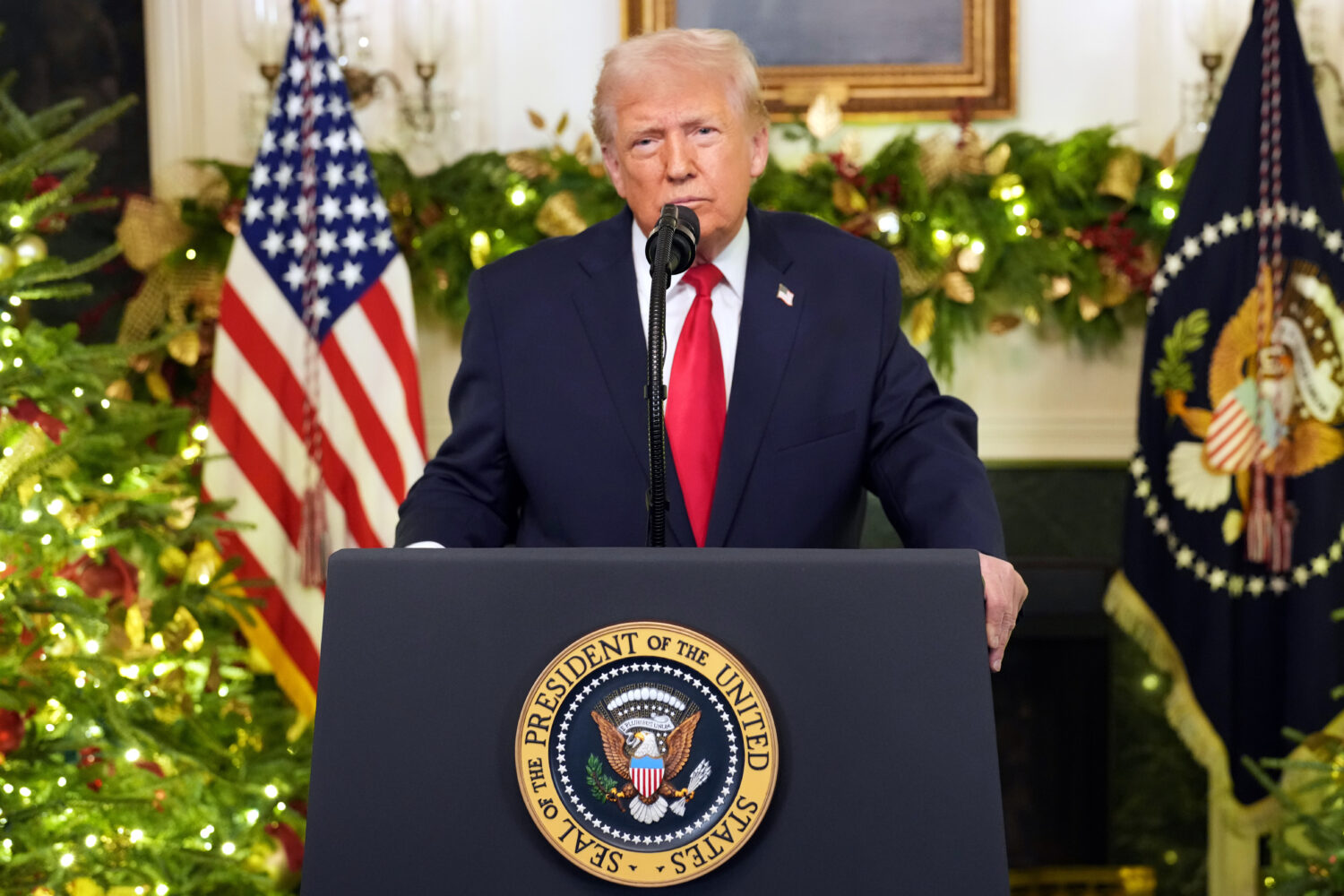 President Donald Trump speaks during an address to the nation from the Diplomatic Reception Room at...