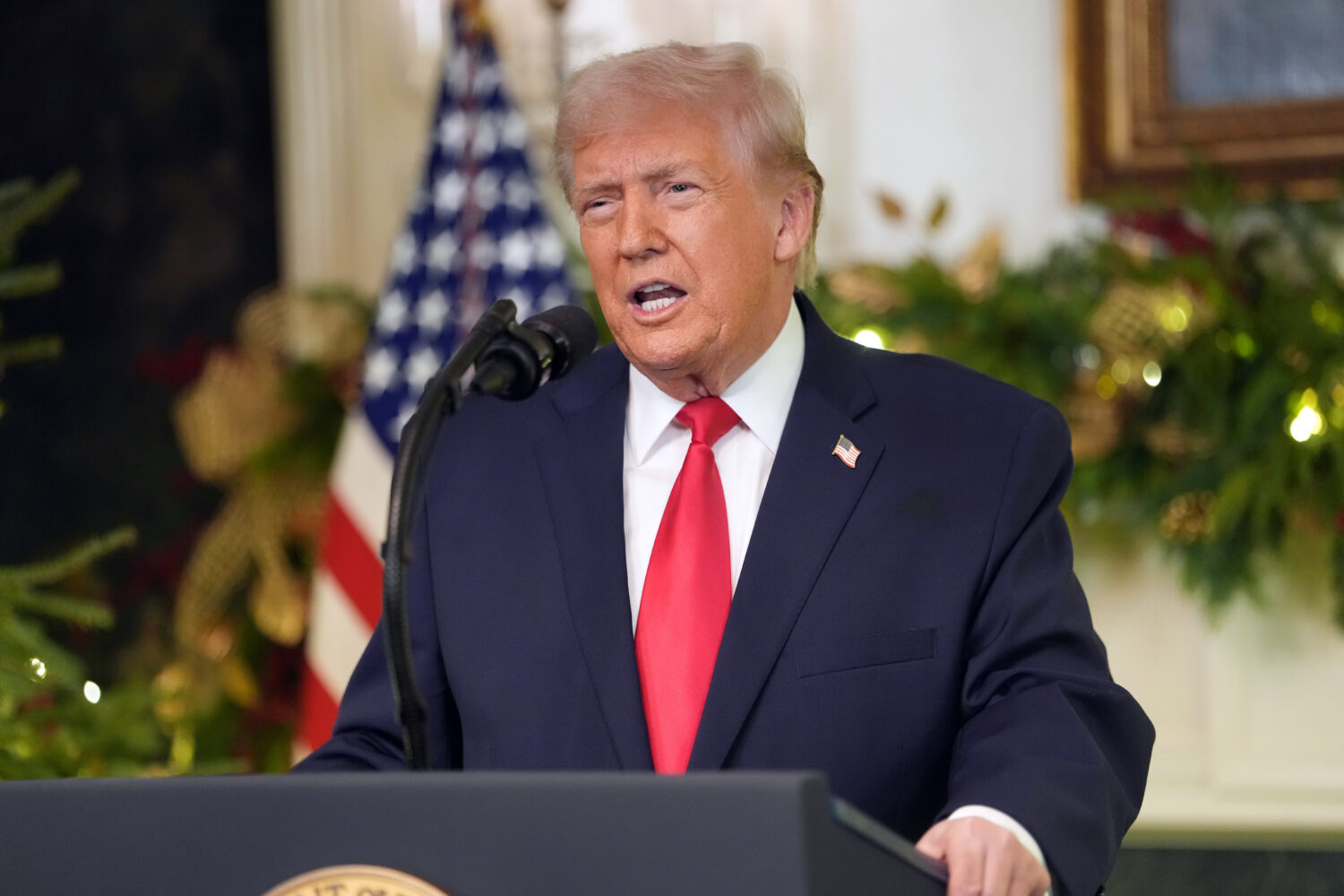 President Donald Trump speaks during an address to the nation from the Diplomatic Reception Room at...