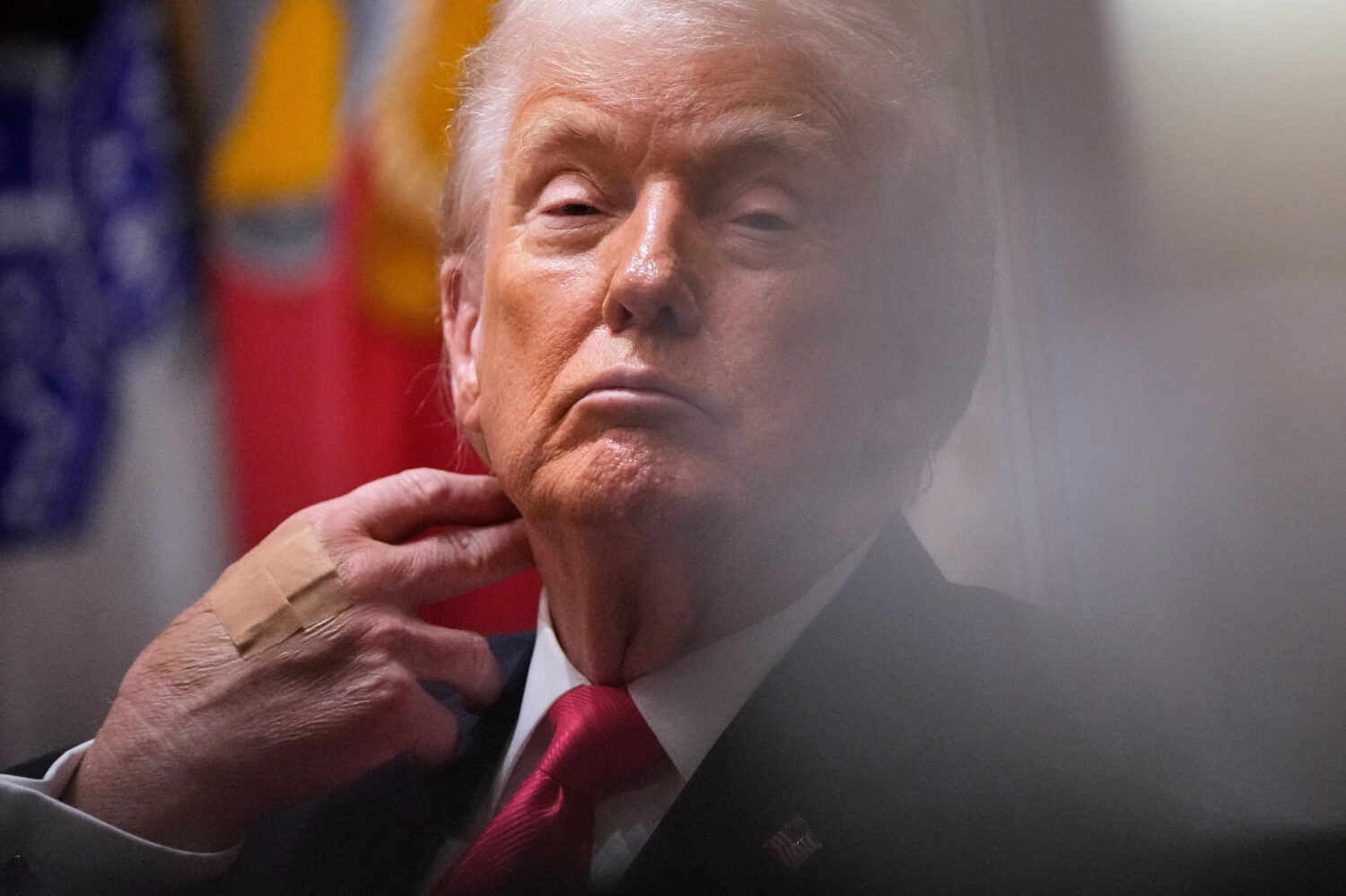 President Donald Trump listens during a Cabinet meeting at the White House, Tuesday, Dec. 2, 2025, ...