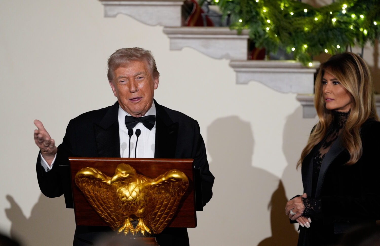 President Donald Trump and first lady Melania greet guests in the Grand Foyer of the White House du...