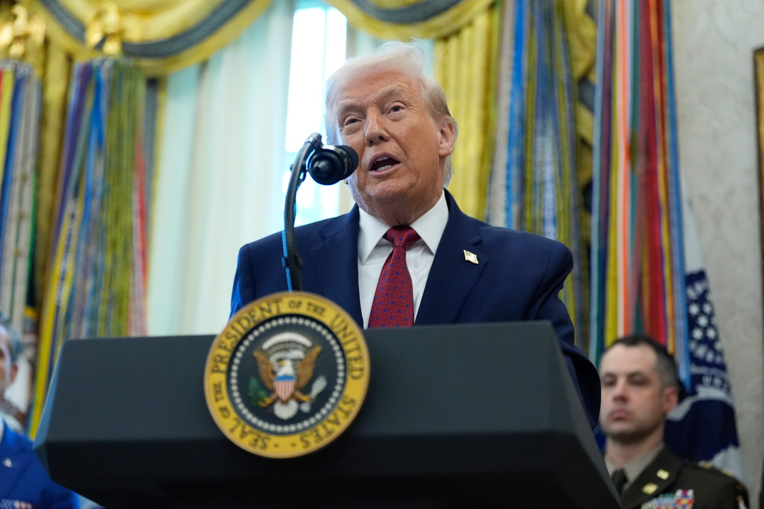 President Donald Trump speaks during a Mexican Border Defense Medal presentation in the Oval Office...