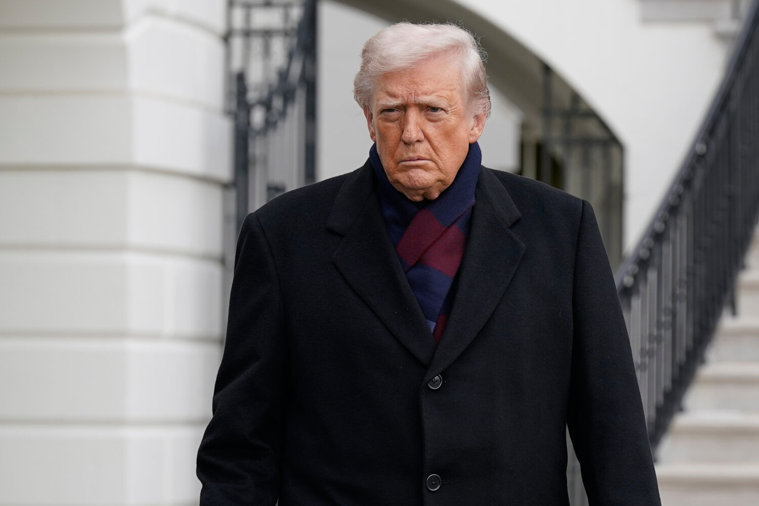 President Donald Trump talks to reporters as he departs from the South Lawn of the White House, Sat...