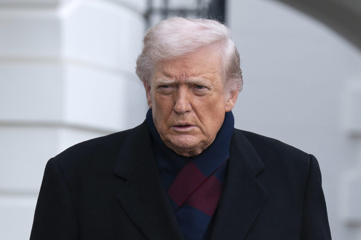 President Donald Trump talks to reporters as he departs from the South Lawn of the White House, Sat...