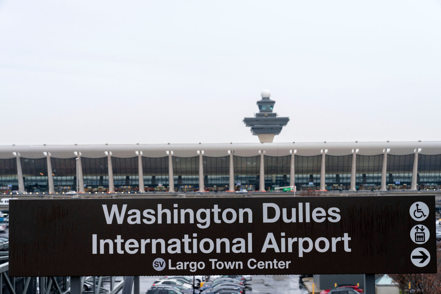 FILE - A sign of Washington Dulles International Airport station is seen during the opening of new ...