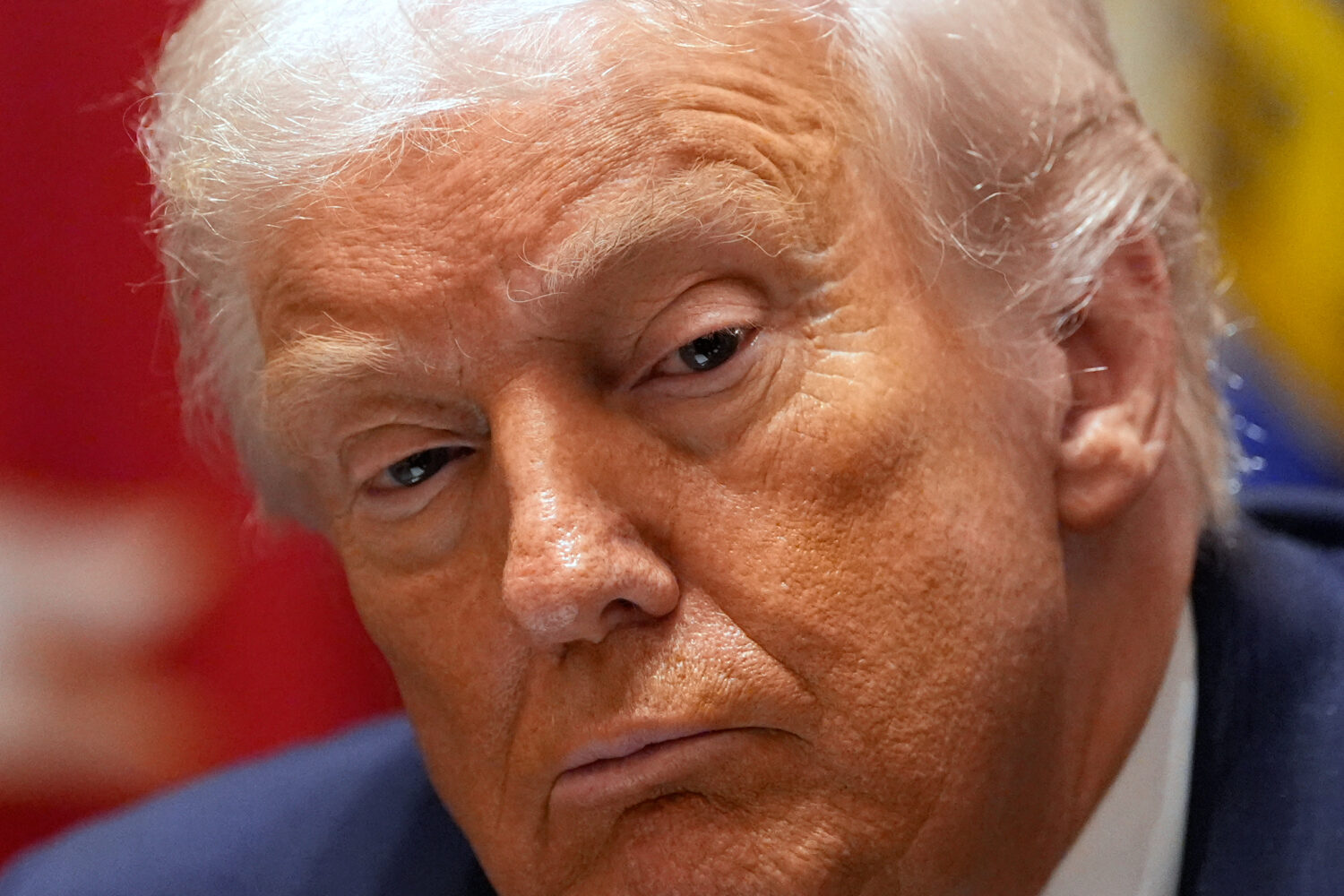 President Donald Trump listens during a roundtable on farm subsidies in the Cabinet Room of the Whi...