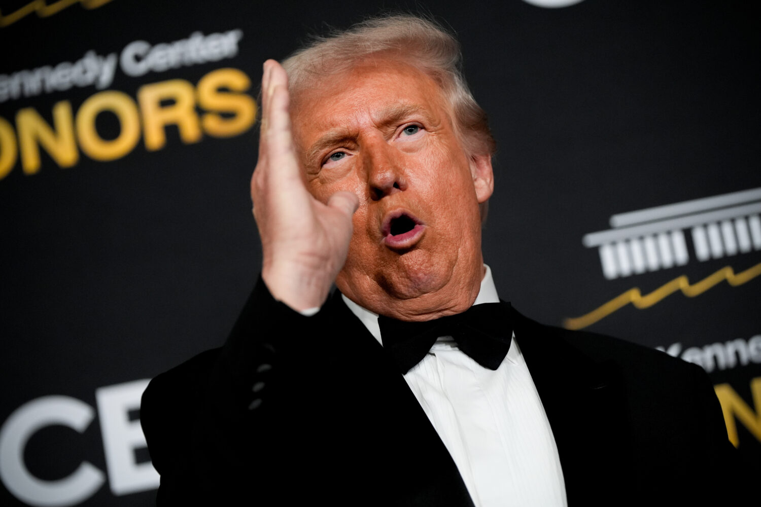 President Donald Trump speaks on the red carpet before the 48th Kennedy Center Honors, Sunday, Dec....