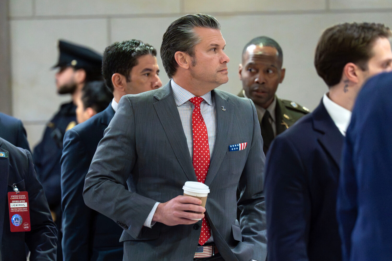 Defense Secretary Pete Hegseth walks to the auditorium to brief members of Congress on military str...