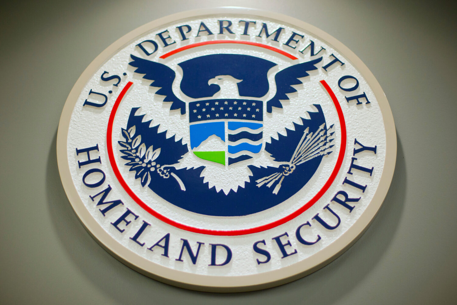 FILE - The Department of Homeland Security logo is seen during a news conference in Washington, Feb...