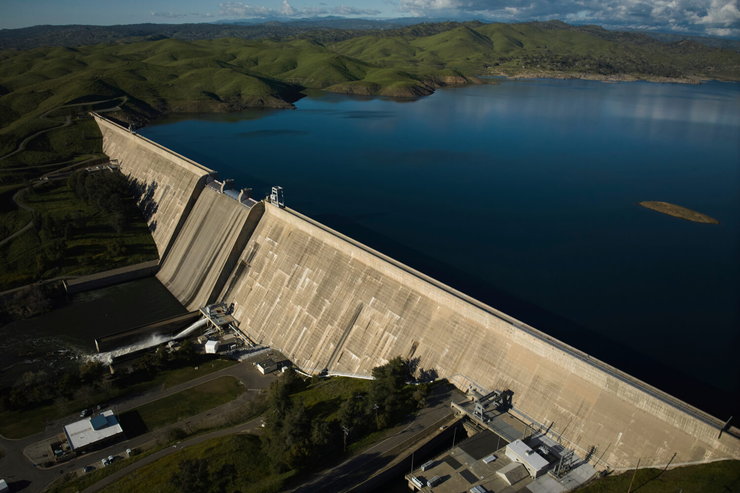 FILE - An aerial view shows Friant Dam which holds back Millerton Lake in Friant, Calif., Friday, M...