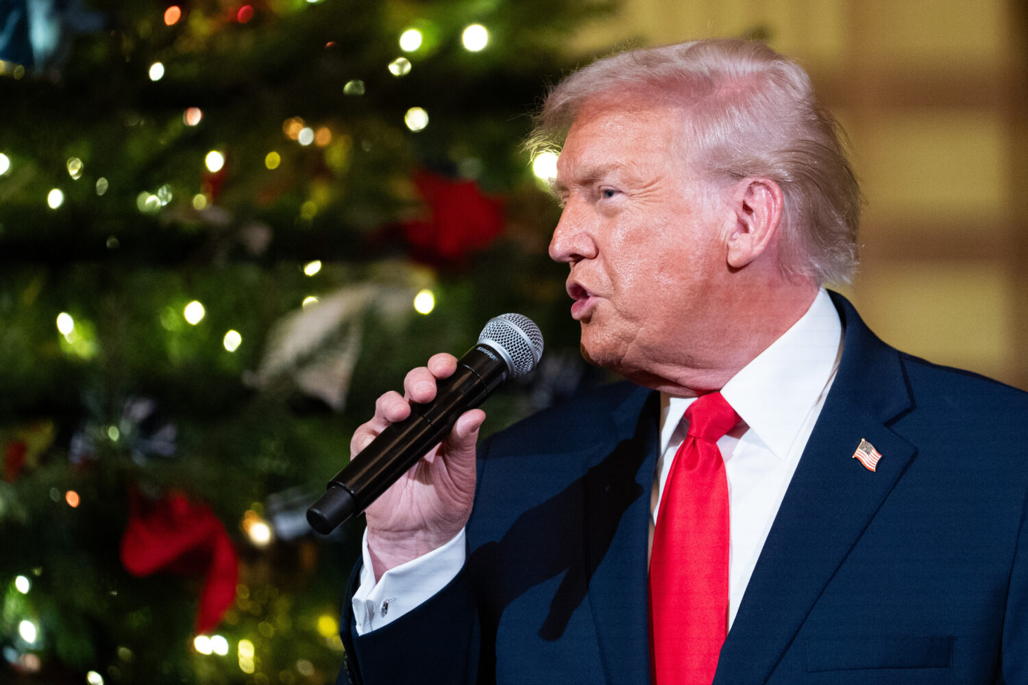President Donald Trump speaks before a concert by Andrea Bocelli in the East Room of the White Hous...