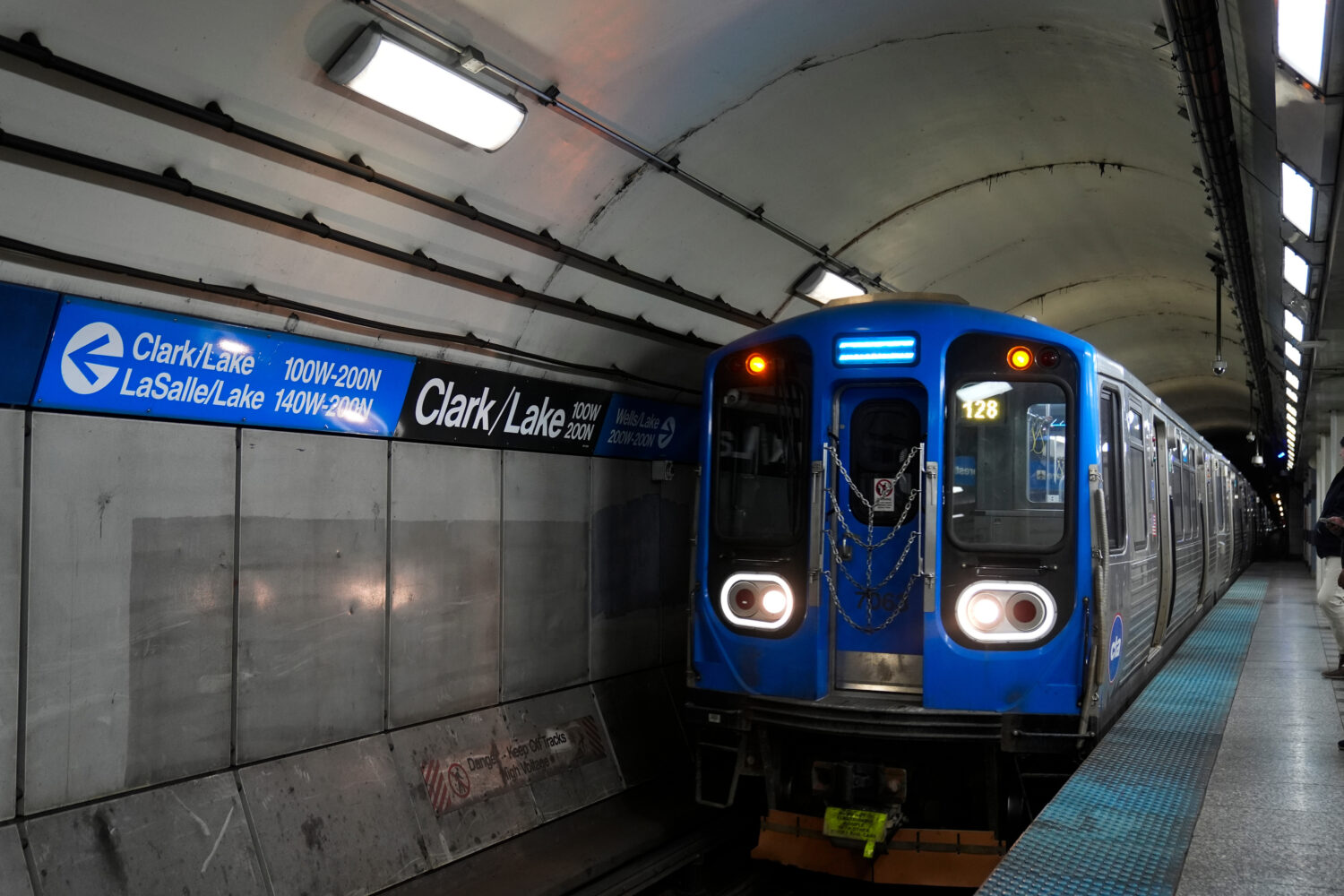 A train pulls into the Clark Street and Lake Street Blue Line stop where a man doused a woman in li...